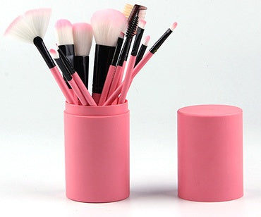 12 piece makeup brush set by Bella Bliss Cosmetics in a pink holder for flawless application