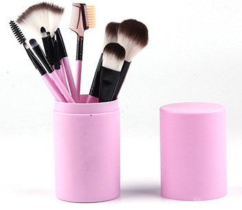 12 piece makeup brush set in a pink holder with various brushes for flawless application