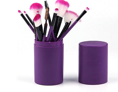 12 piece makeup brush set in a purple holder, perfect for applying makeup and enhancing beauty looks