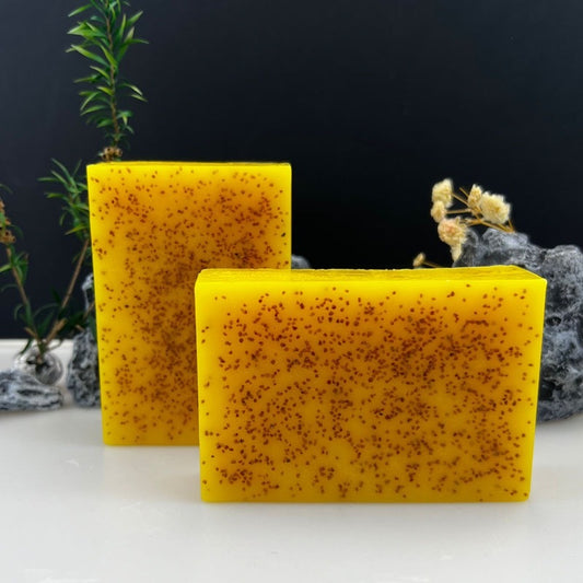Original Japanese kojic acid soap for dark spots with exfoliating texture and vibrant yellow color